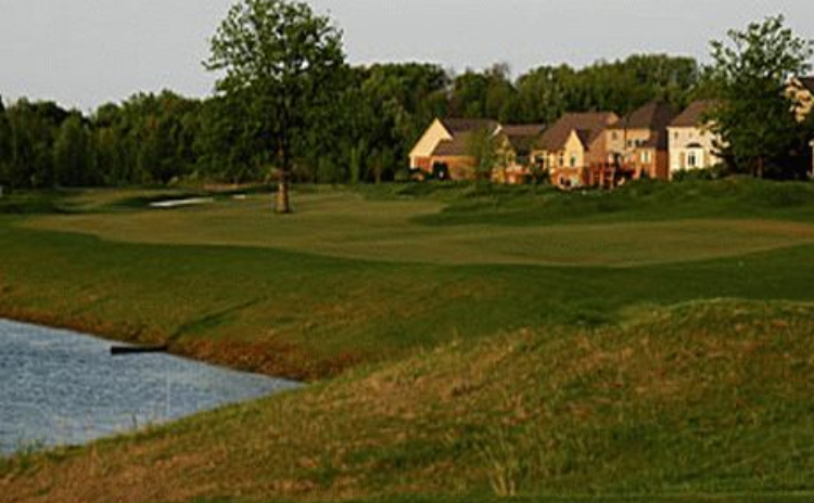 Course view with homes to the right